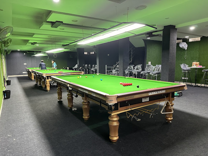 Avi’s Cue & Cafe Snooker Club