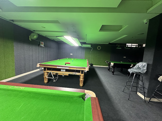 Avi’s Cue & Cafe Snooker Club