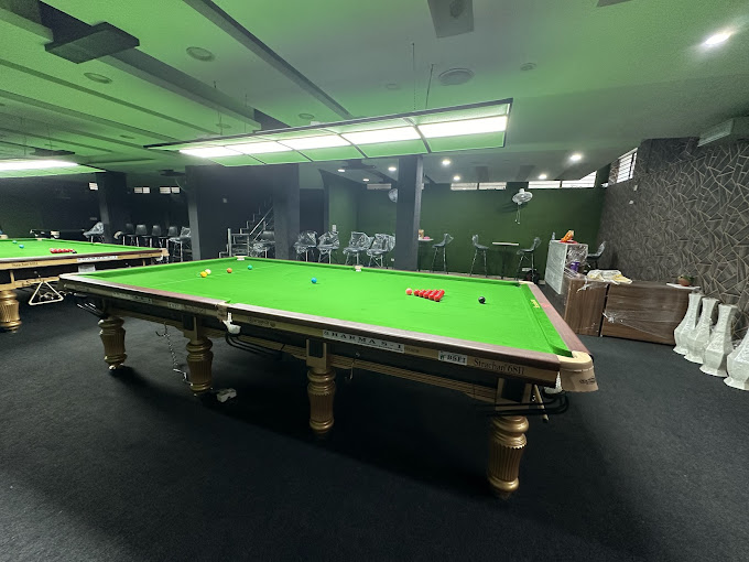 Avi’s Cue & Cafe Snooker Club